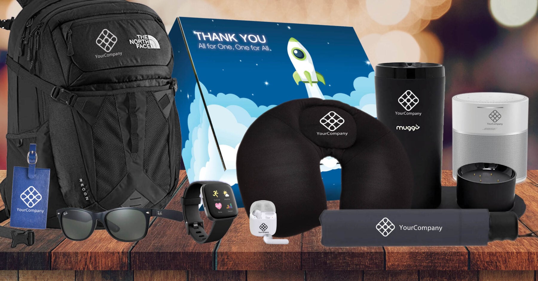 Branded onboarding kit example with backpack, drinkware, and tech accessories